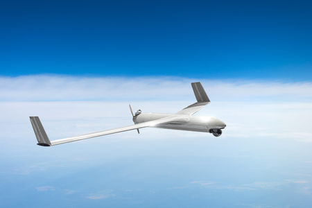 Unmanned military drone on patrol air sky at high altitudeの写真素材