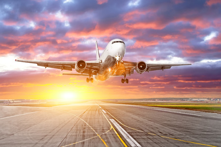 Airplane landing on runway airport 3d renderの写真素材