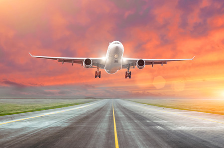 Airplane landing on runway airport 3d renderの写真素材
