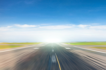 Empty road with the effect of the speed of movementの写真素材