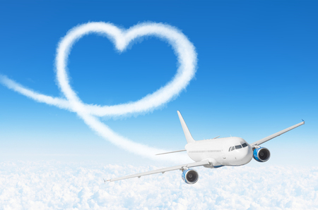Love heart cloud drawing by airplane. Love concept for traveling the worldの写真素材