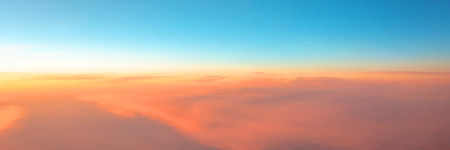 Panorama of the evening sky sunset gradient from warm to cold colorの写真素材