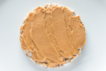 Rice cereal cracker with peanut paste butterの写真素材