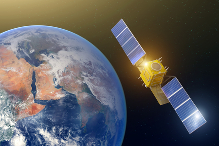 Space communications satellite in high orbit earth.の写真素材