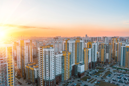 Residential area multi-storey high-rise buildings to the horizon, the evening sky view sunset lightの写真素材