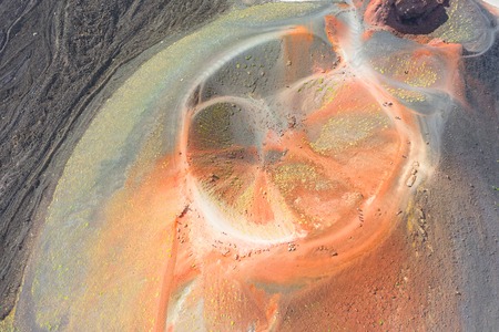 Old extinct inactive craters on the slope of the volcano Etna with tourist trails, aerial top viewの写真素材