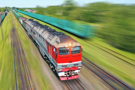 Freight train going in a hurry along the train at high speed. Railway Transport Conceptの写真素材