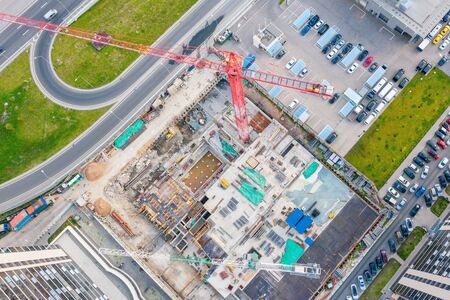 Construction of a high-rise building in the business district of the city, aerial view