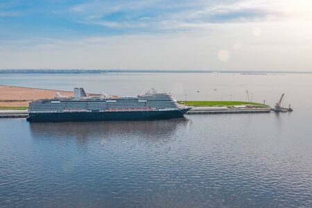 Passenger port in city cruise liners, preparing for departure on a tripの写真素材