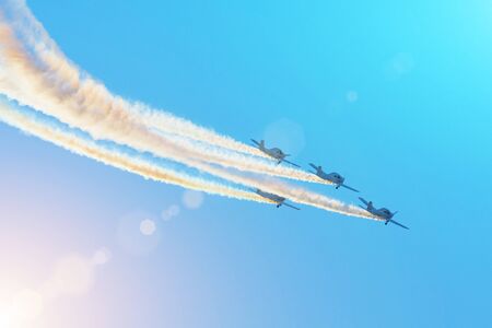 Aerobatic team fly smoothly on turboprop light-engine aircraft in the air