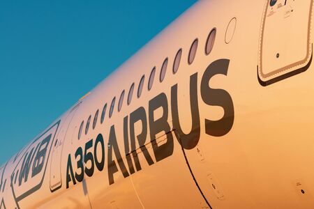 Airbus a350-900 XWB View of the fuselage plane sunset light. Russia, Moscow region Zhukovsky,...