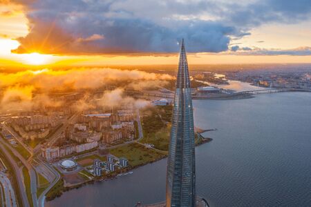 Aerial view of the spire of a skyscraper Lakhta Center and a panorama coast of the Gulf of Finland and the islands of the city, the Zenith Arena stadium. Russia, Saint-Petersburg, 10 september 2019のeditorial素材