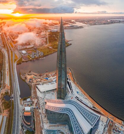 Aerial view of the spire of a skyscraper Lakhta Center and a panorama coast of the Gulf of Finland and the islands of the city, the Zenith Arena stadium. Russia, Saint-Petersburg, 10 september 2019のeditorial素材