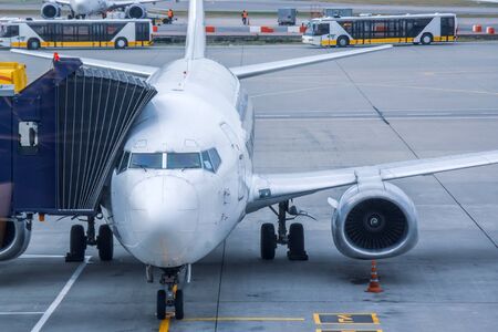 Passenger aircraft, waiting parked at the airport before serving the flight