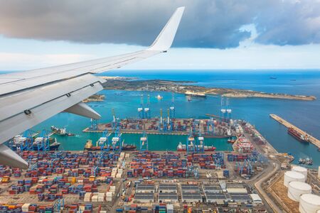The port transporting containers, wing view. Malta, Il Brolli Marsaxlokk, Malta-Freeport. 14 may 2019のeditorial素材