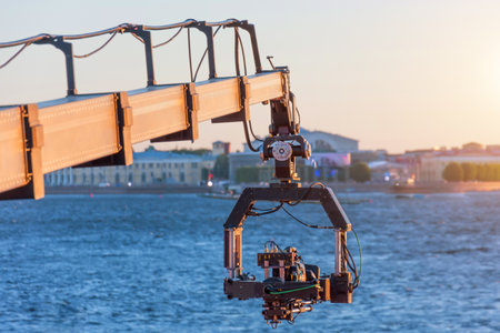 TV camera on a crane on at a public mass event