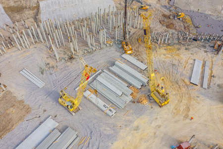 Equipment for installing piles in ground, heavy machines for driving pillars work in laying the...