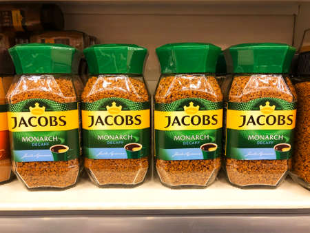 Jacobs Monarch decaff freeze dried granulated instant coffee, row of coffee glass jars in a...