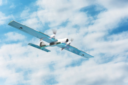 Unmanned aerial vehicle flight motion blur effect in the cloudy sky