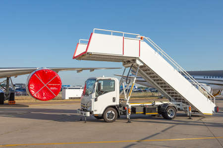 Car ladder for boarding passengers on the planeの写真素材