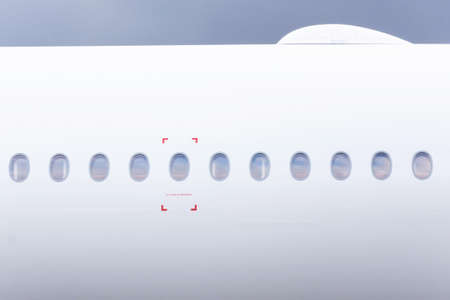 Airplane fuselage with portholes and satellite internet module on the roof wi fiの写真素材