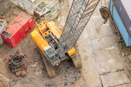 Construction crane boom on crawler tracks, aerial viewの写真素材