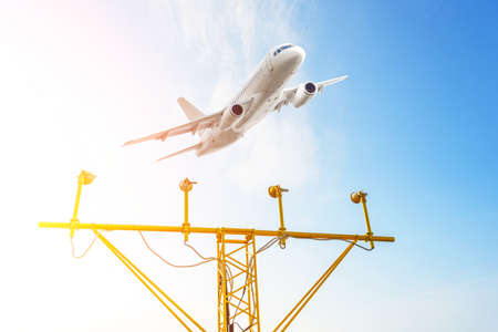 Airport approach landing lights. Airplane on the glide slope. Take off at the airportの写真素材
