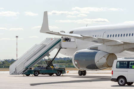 Gangway ladder ramp and boarding passengers on board the aircraft