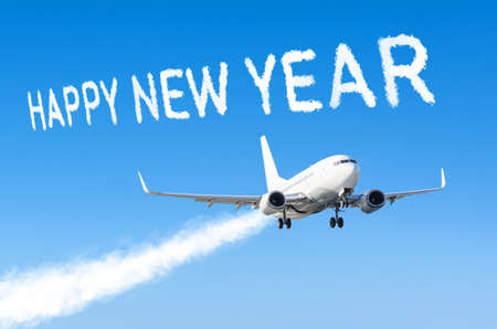 Drawing by airplane vapor steam contrail in blue sky. Happy new year concept