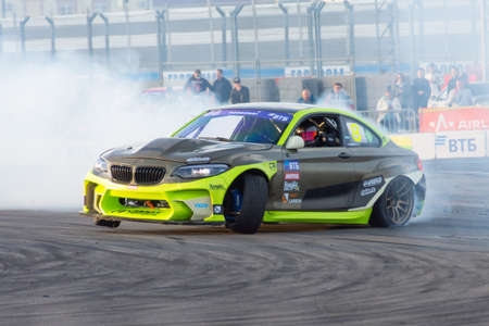 BMW car drifts around turn corners. Russia, Sochi 04 December 2021
