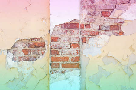 Wall and load-bearing column with peeled plaster, color gradientの写真素材