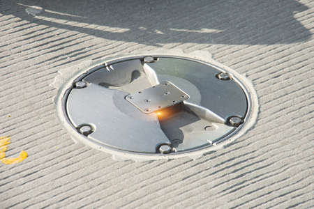 Axial light in the concrete pavement of the runway and steering tracks, coated taxiway