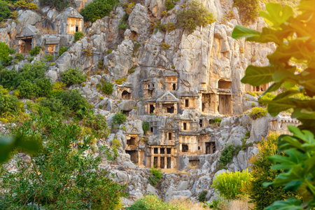 Ancient unexplored century old city in the rocks windows and entrances of the cave among the jungles of asiaの写真素材