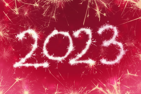 Numbers 2023 symbol inscription on a background color of the year collaborations from flashes of sparklers, candies from sparks. Trendy fashion color palette sample. Festive letteringの写真素材