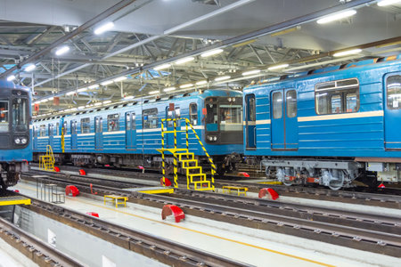 Passenger trains arriving for service at the electric depotの写真素材
