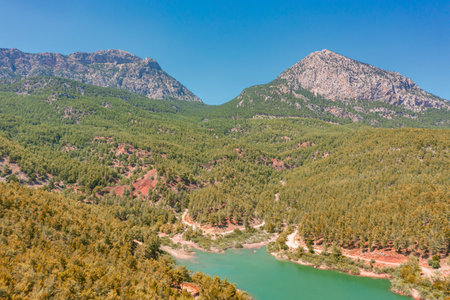 Aerial view of National Park plateau, high rock. Wooden Lake reservoir forest among rocky mountains and peaksの写真素材