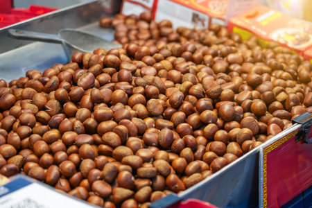 Roasted chestnuts on a street market stall.の写真素材