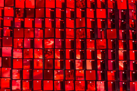 Shiny red mosaic in the shape of squares, disco texture beautiful backgroundの写真素材