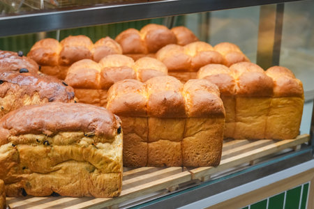 Soft fluffy white bread loaf, Japanese milk bread on display in a store.