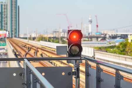 Railway traffic light in the area of a train stationの写真素材