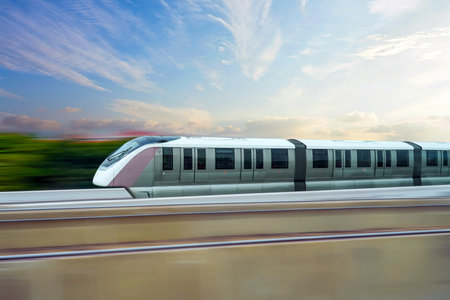 High speed monorail train race station on the stage road junction, side view motion blur effectの写真素材