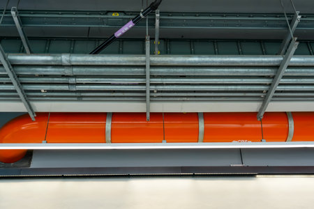 Ceiling with water supply and drainage communication pipes under the bridge support station platform