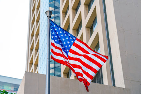 American flag and Modern buildings in the metropolis.