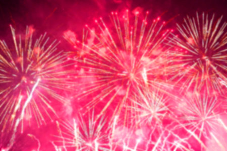 Fireworks on the dark sky background. Colorful fireworks blur softness out of focus.の写真素材