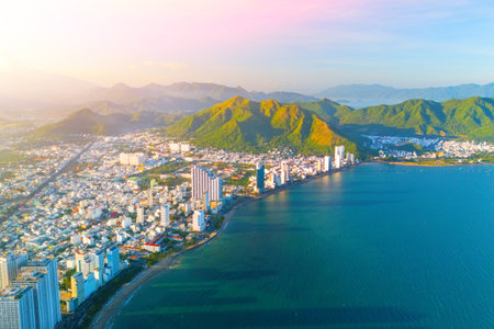 Beach overlooking aerial view city on the coast of Southeast Asia in the evening at dawn sunset Nha Trang.の写真素材