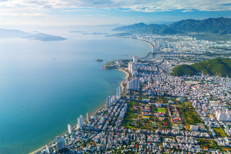 Aerial view beach overlooking city on the coast of Southeast Asia in the morning at dawn sunrise Nha Trang.の写真素材