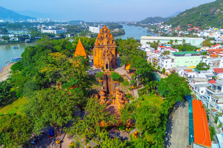 Aerial view of Ponagar tower in city at morning time among the urban development. Vietnam, Nha Trang.の写真素材