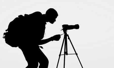 Half Bent Photographer in Actionの写真素材