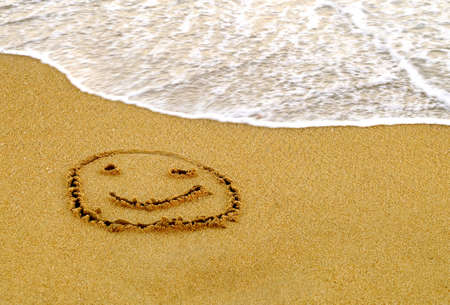 Happy Smiley on a Beachの写真素材