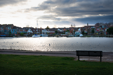 Riverside park path sceneの写真素材